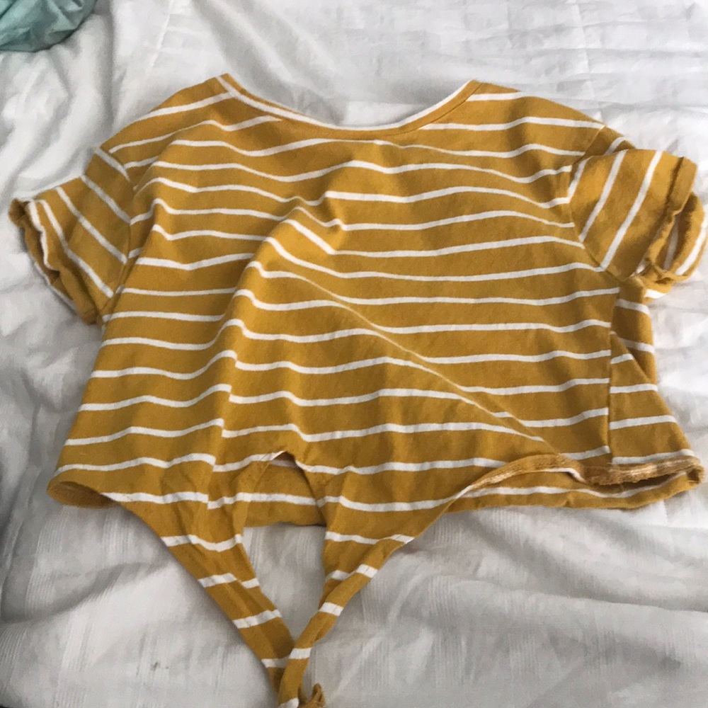 This is a mustard yellow striped shirt with a tie